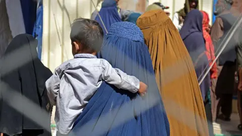 Getty Images File image of Afghan migrants who have crossed into Pakistan