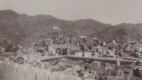 Leiden University Libraries A view of the main mosque in Mecca in a portrait taken in early 20th Century likely from Fort Jiyad, which was demolished in 2002.