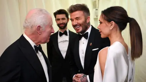 PA Media King Charles and the Beckhams at the King's Highgrove estate in Gloucestershire