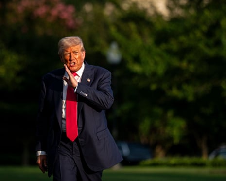 US president Donald Trump walks on the South Lawn of the White House after arriving on Marine One in Washington DC, US.