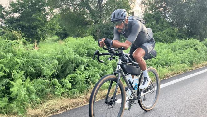 French cyclist Sofiane Sehili, at the start of his journey to cross Eurasia by bicycle, on July 6, 2025.