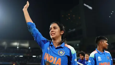 Getty Images Jemimah Rodrigues of India acknowledges the fans after scoring 127 runs for her team's victory in the ICC Women's Cricket World Cup India 2025 Semi-Final match between India and Australia at DY Patil Stadium on October 30, 2025 in Navi Mumbai, India.