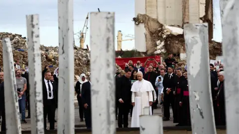Reuters Pope Leo XIV holds a silent prayer at the site of the Beirut port explosion, in Beirut, Lebanon (2 December 2025)
