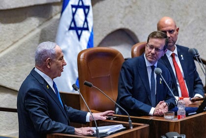 Prime Minister Benjamin Netanyahu (left) and President Issac Herzog (right) at the opening of the winter assembly of the Knesset plenum in Jerusalem, October.