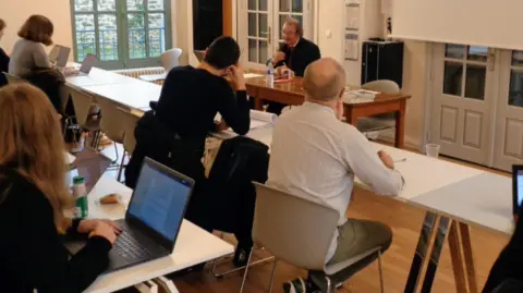 BBC Students listening to a lecturer on the spy course at Sciences Po Saint-Germain university
