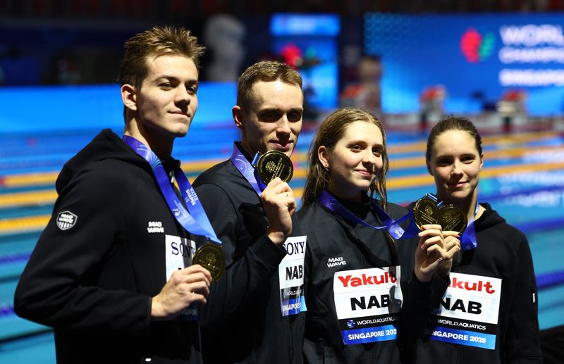 Swimming-Russia hopes swimming return paves way for end to sporting neutrality