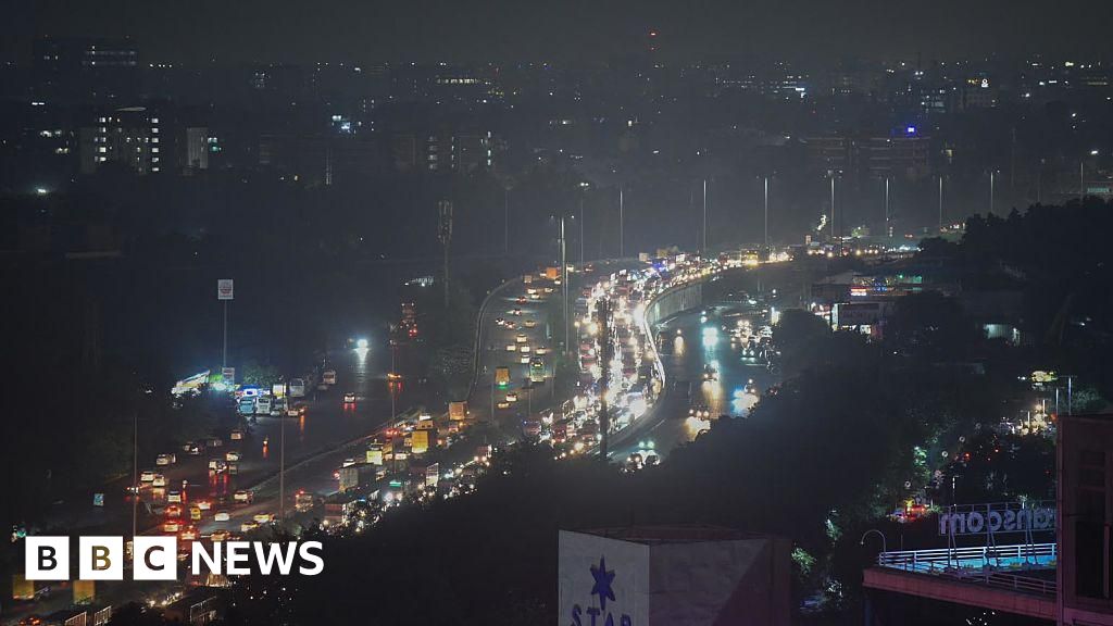 Massive traffic jam stalls Delhi suburb as rains wreak havoc