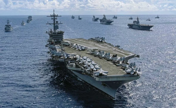 Aircraft carrier group strengthens US position in the Middle East – The Economist