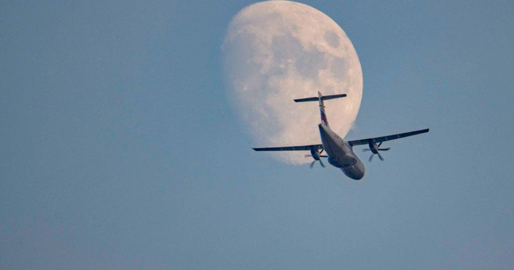 Search underway after passenger aircraft with 11 people goes missing in Indonesia