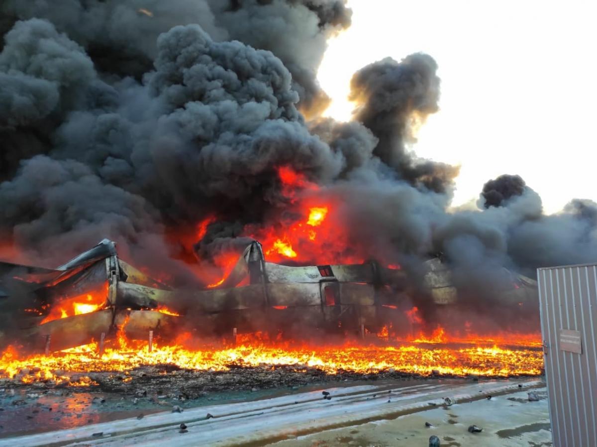 Major Fire Engulfs Port, Military Airfield Targeted