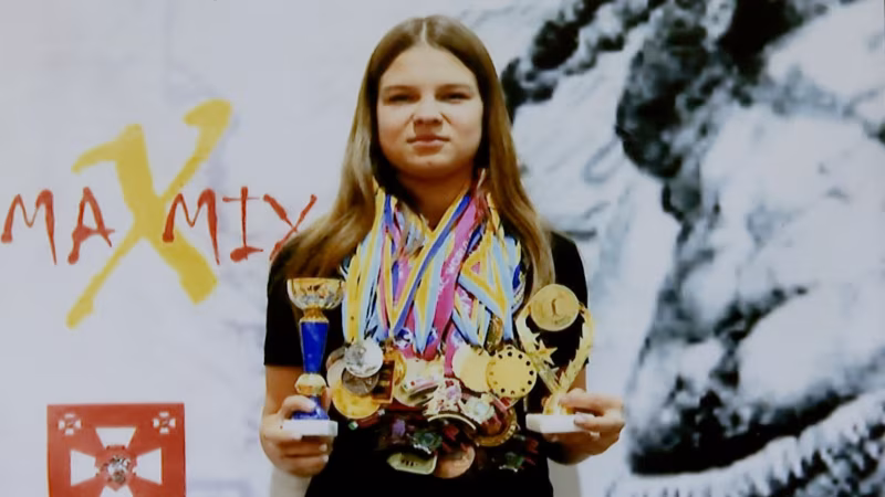 Teen Kickbox Champ Killed in War Honored On Banned Olympic Helmet