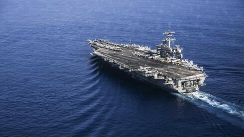 Iran cites US carrier ‘withdrawal’ as talks begin amid deep disagreements