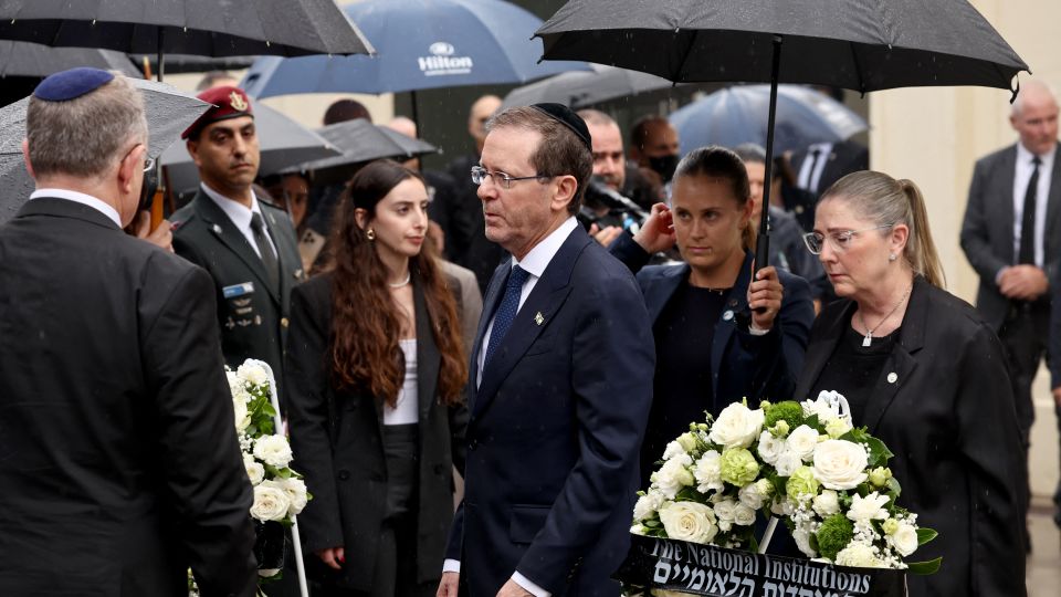 Israel’s president mourns antisemitic massacre in Australia, where fury over Gaza still divides