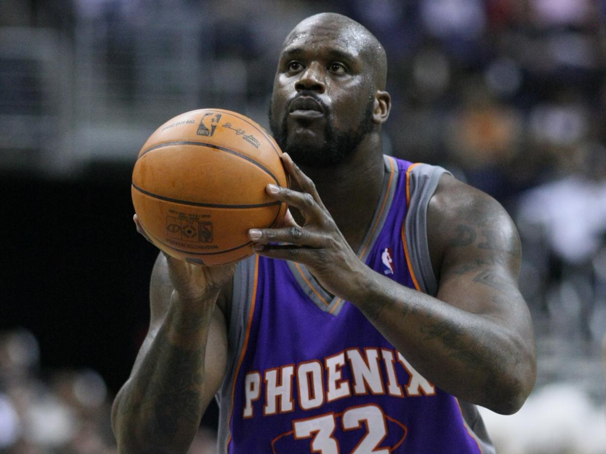 World’s Tallest Model Ekaterina Lisina Meets NBA Legend Shaquille O’Neal