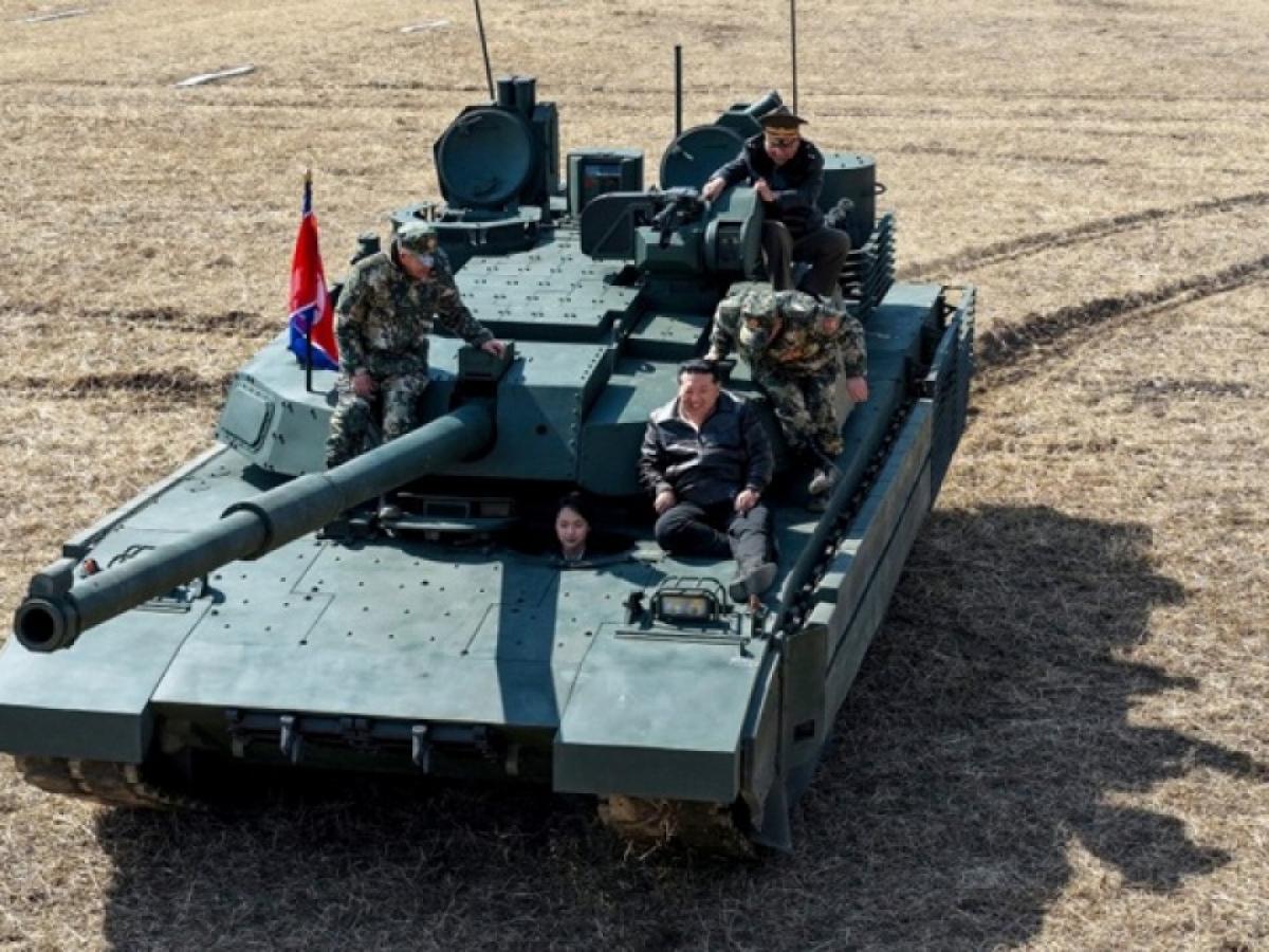 Kim Jong Un and Daughter Ride New Tank During Military Exercises