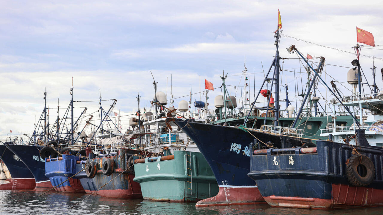 Thousands of Chinese boats mass at sea, raising questions