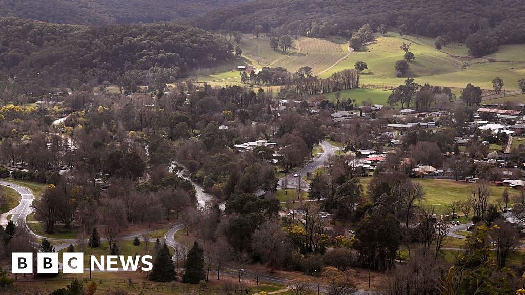 Shock, sadness and relief in town at centre of Australia's seven-month police manhunt