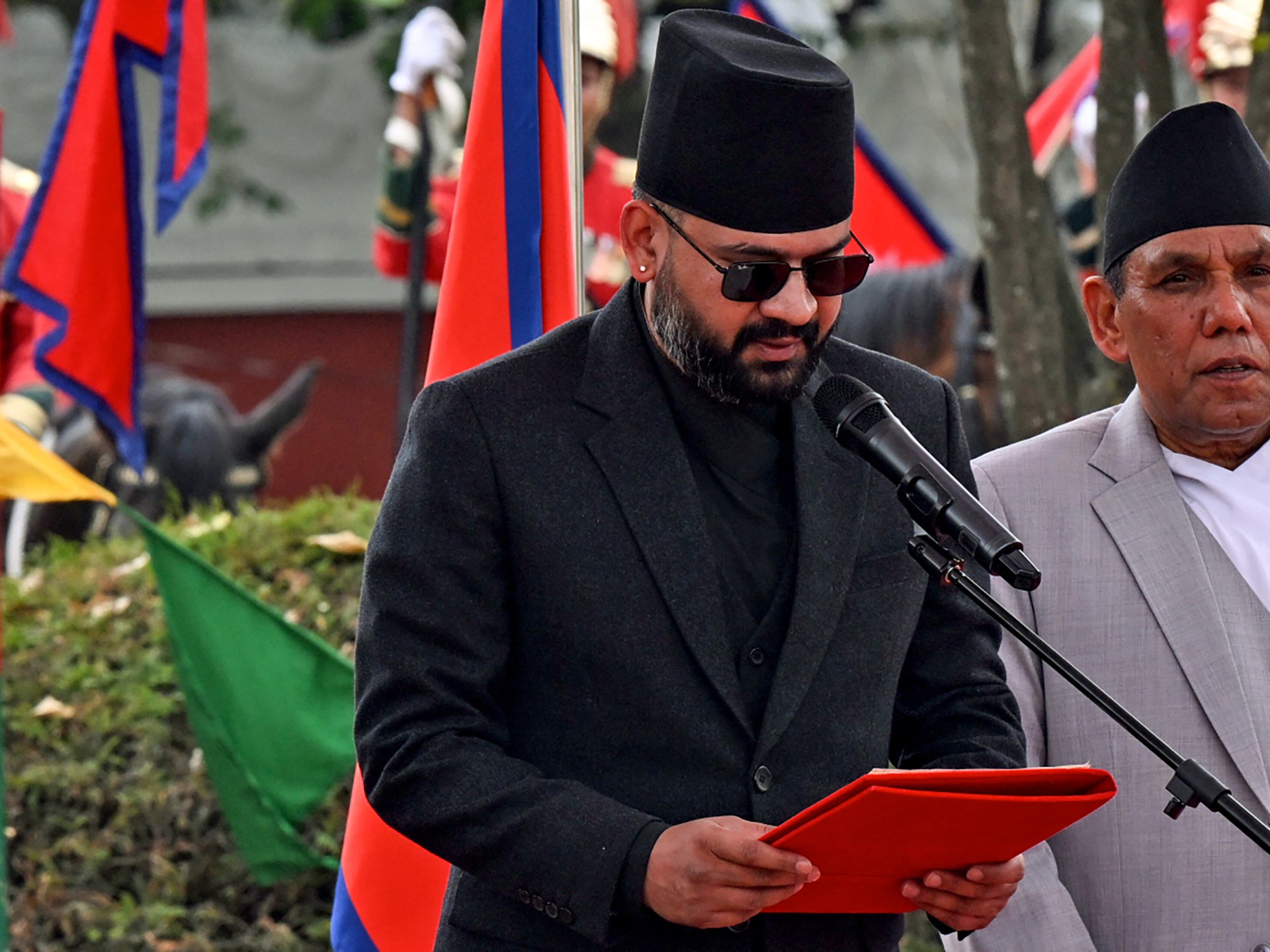 Nepal’s youngest premier sworn in after releasing new rap song about unity | News