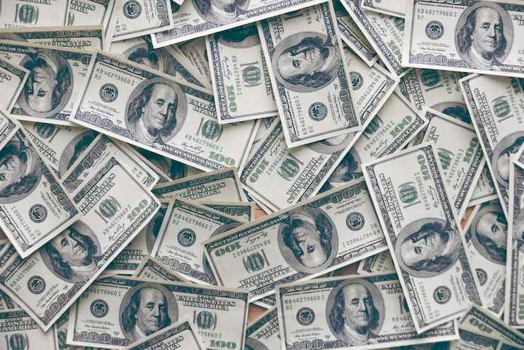 How did the gold standard for the dollar become a global deception?